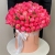 Композиция в шляпной коробке из 113 пионов Корал Шарм в Королеве